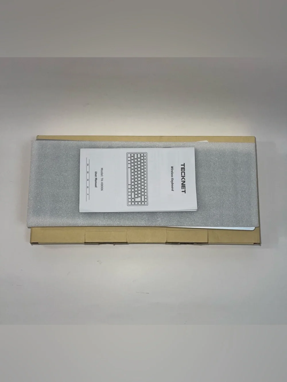 Wireless Keyboard in Brown Packaging